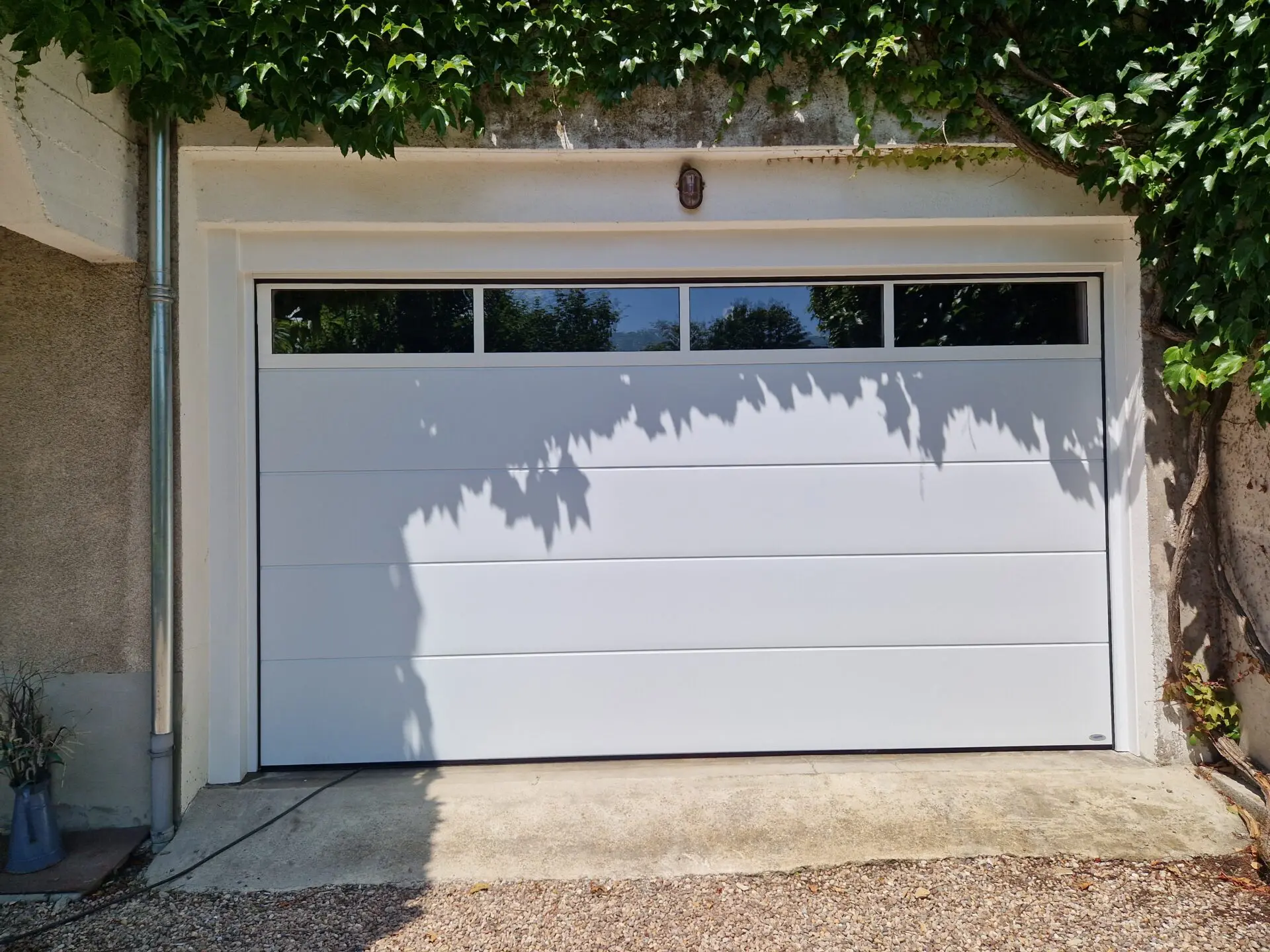 porte de garage aluminium blanc tomblaine